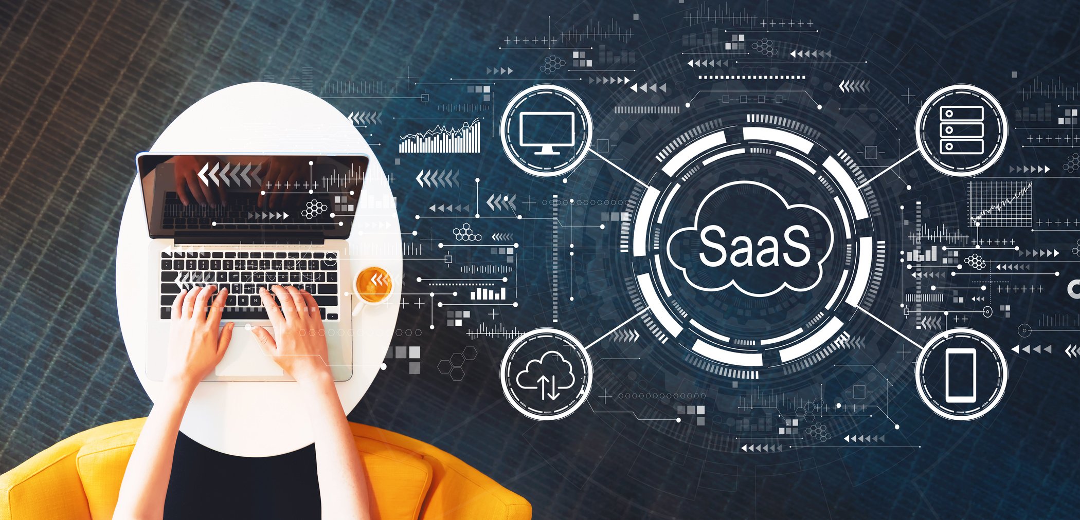 SaaS - software as a service concept with person using a laptop