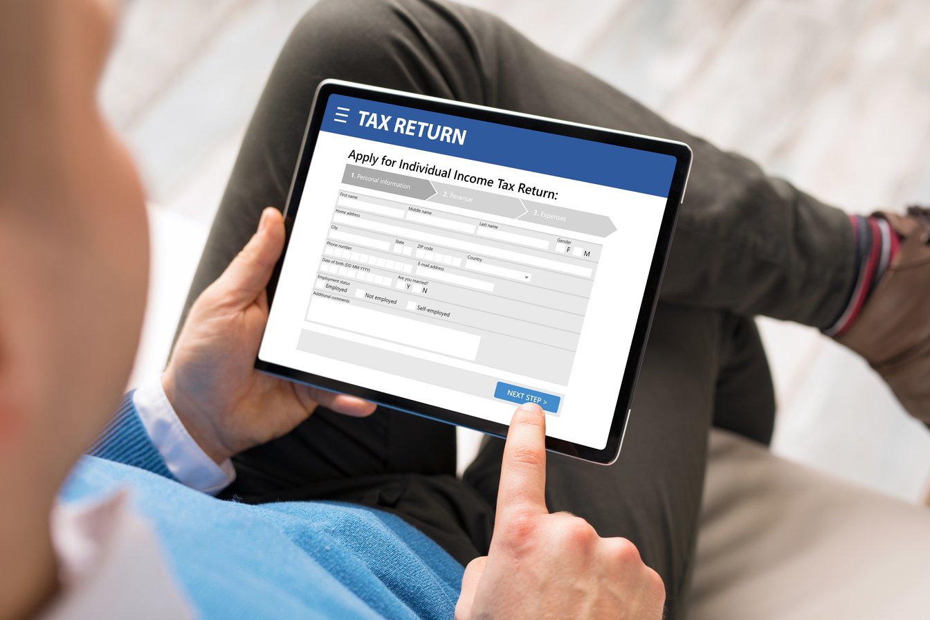 Man Submits Electronic Income Tax Return Form Online